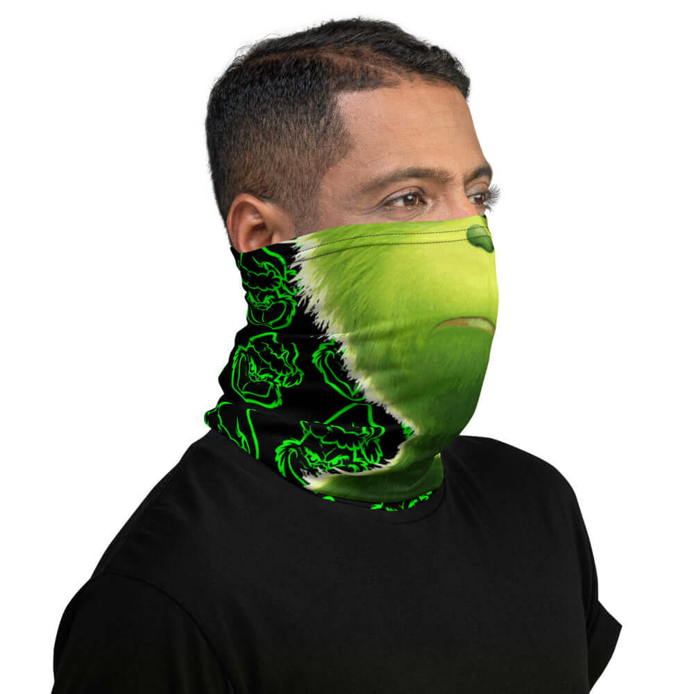 Man wearing "Da Grinch" neck gaiter looking left
